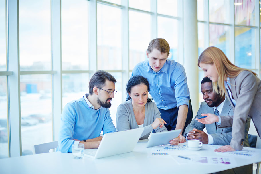 Advisory team reviewing market charts